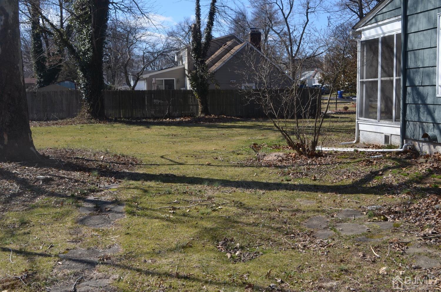 75 West Hill Road Colonia, NJ 07067 - Photo 8 of 35 a view of a yard with swimming pool