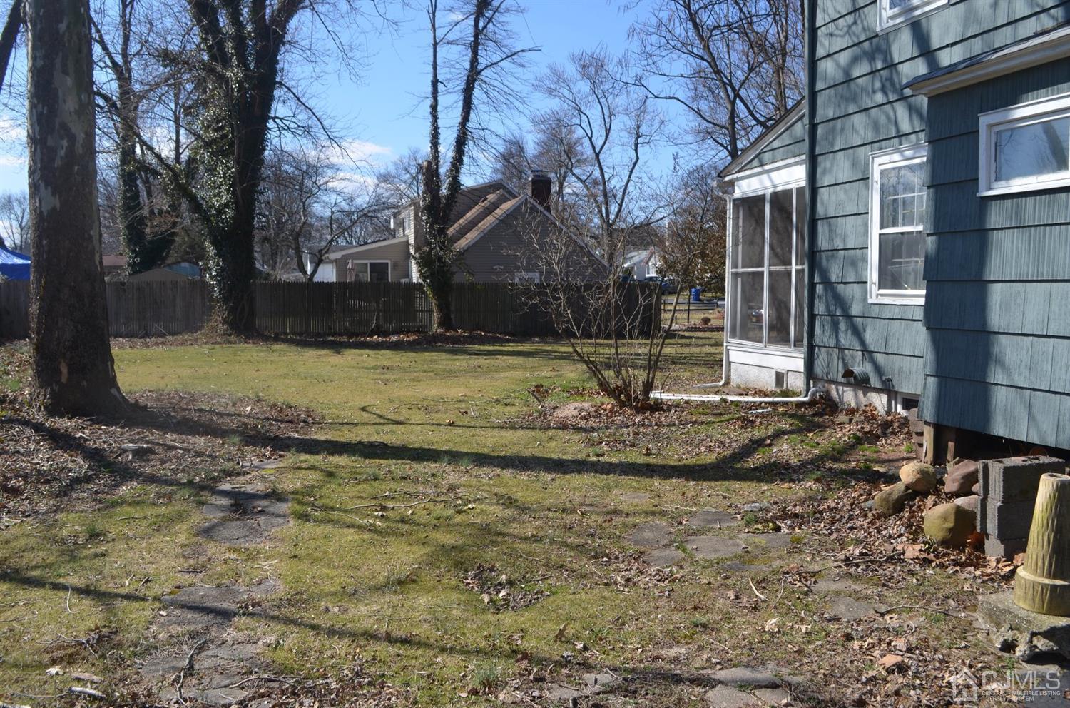 75 West Hill Road Colonia, NJ 07067 - Photo 9 of 35 a view of a yard with a tree