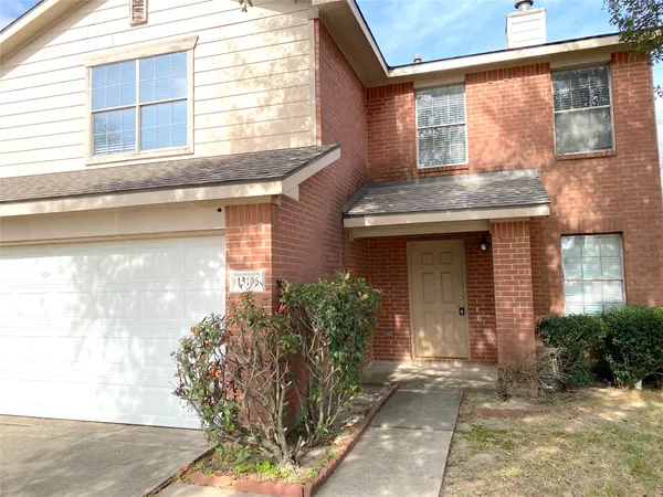 a front view of a house having yard