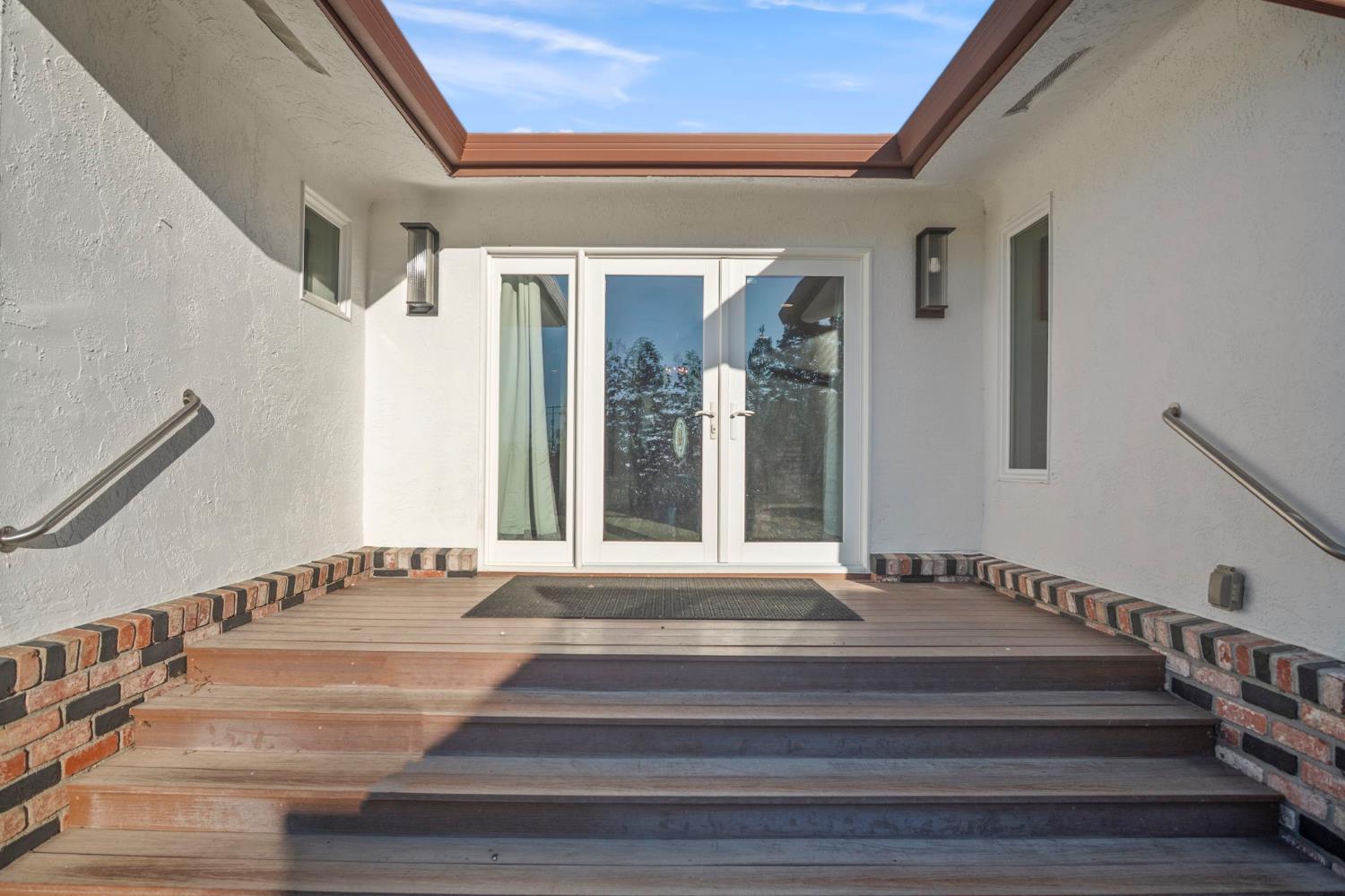 20201 Dustin Road Acampo, CA 95220 - Photo 14 of 23 a view of staircase with white walls and windows