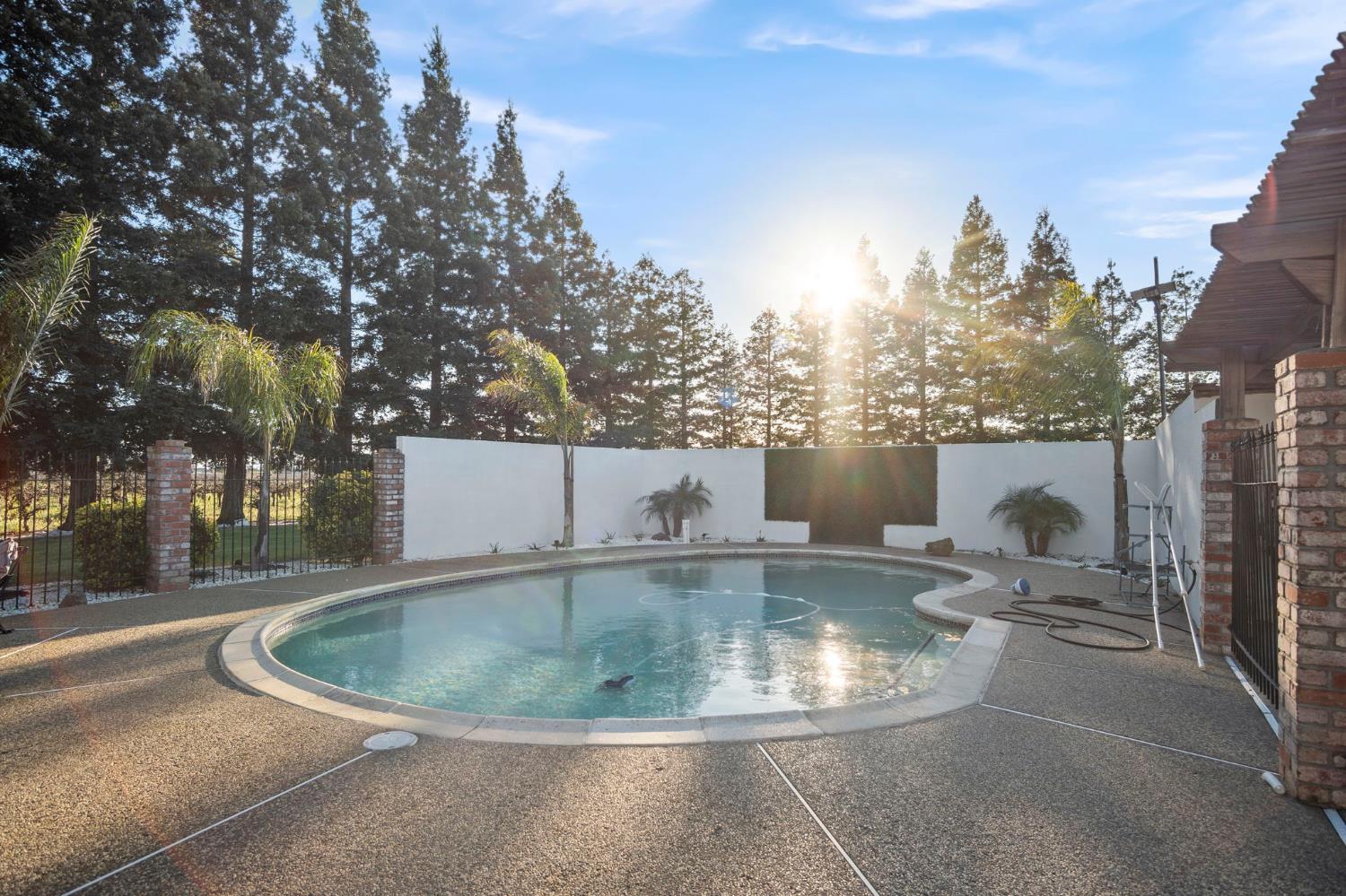 20201 Dustin Road Acampo, CA 95220 - Photo 18 of 23 a view of a fountain is middle in the house