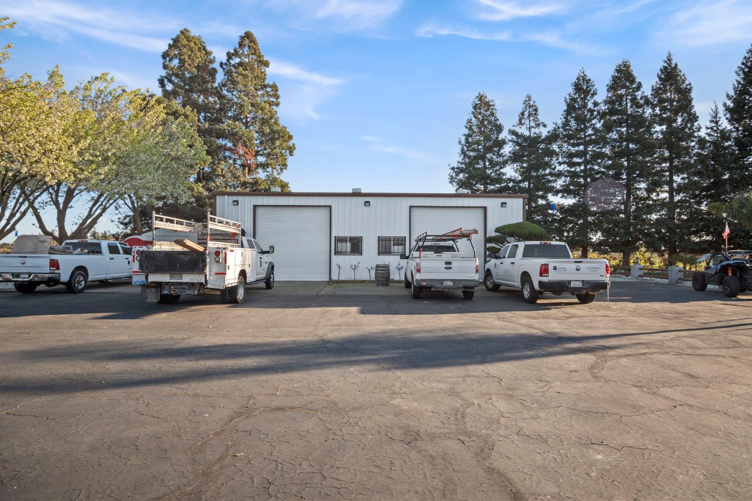20201 Dustin Road Acampo, CA 95220 - Photo 2 of 23 a car parked on the side of a street