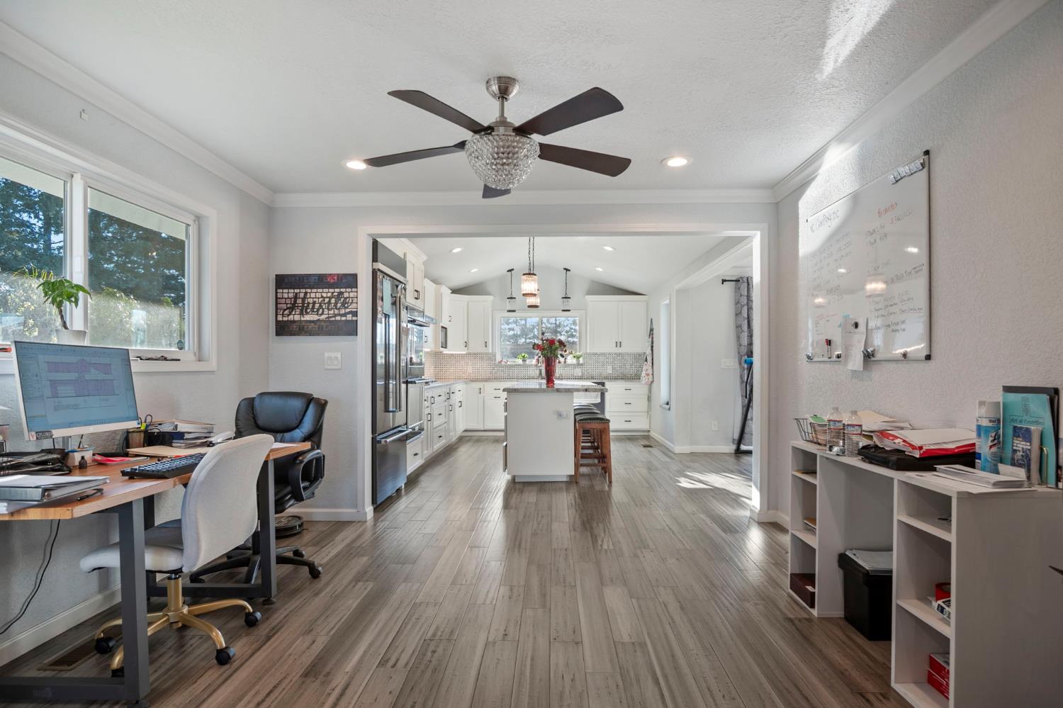 20201 Dustin Road Acampo, CA 95220 - Photo 10 of 23 a kitchen and a dining table chairs in it