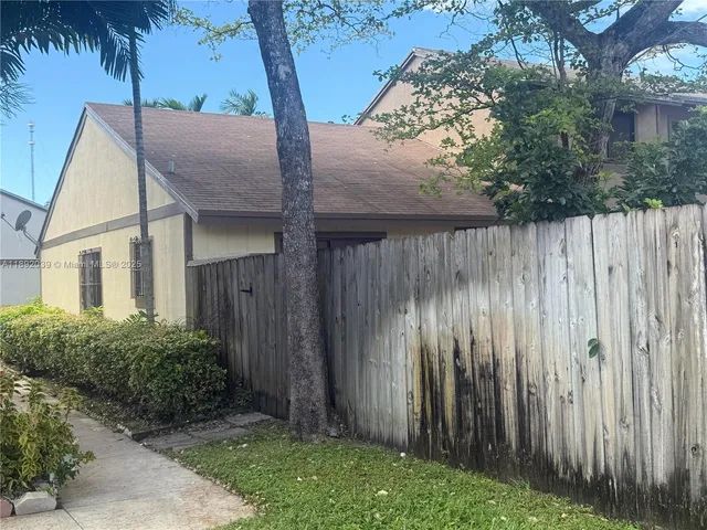 a house view with a garden space