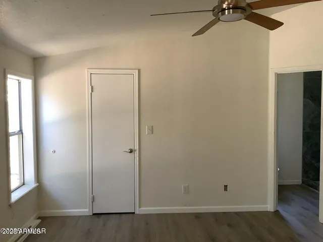an empty room with a door