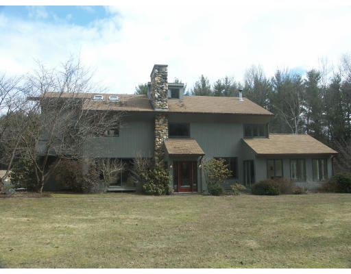 307 Audubon Road Northampton, MA 01053 - Photo 1 of 1 a front view of a house with a yard