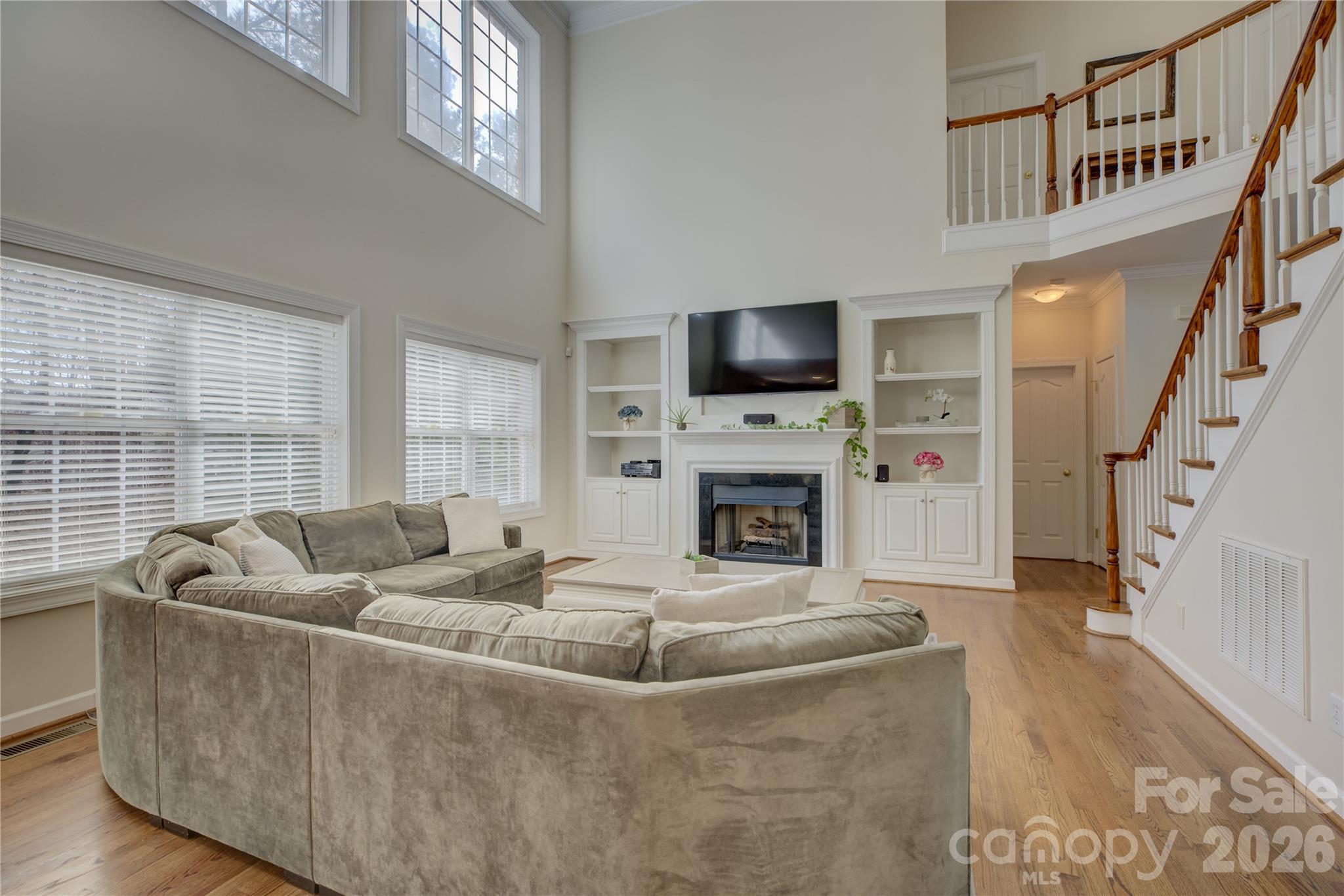 16624 Turtle Point Road Charlotte, NC 28278 - Photo 17 of 46 a living room with furniture and a flat screen tv