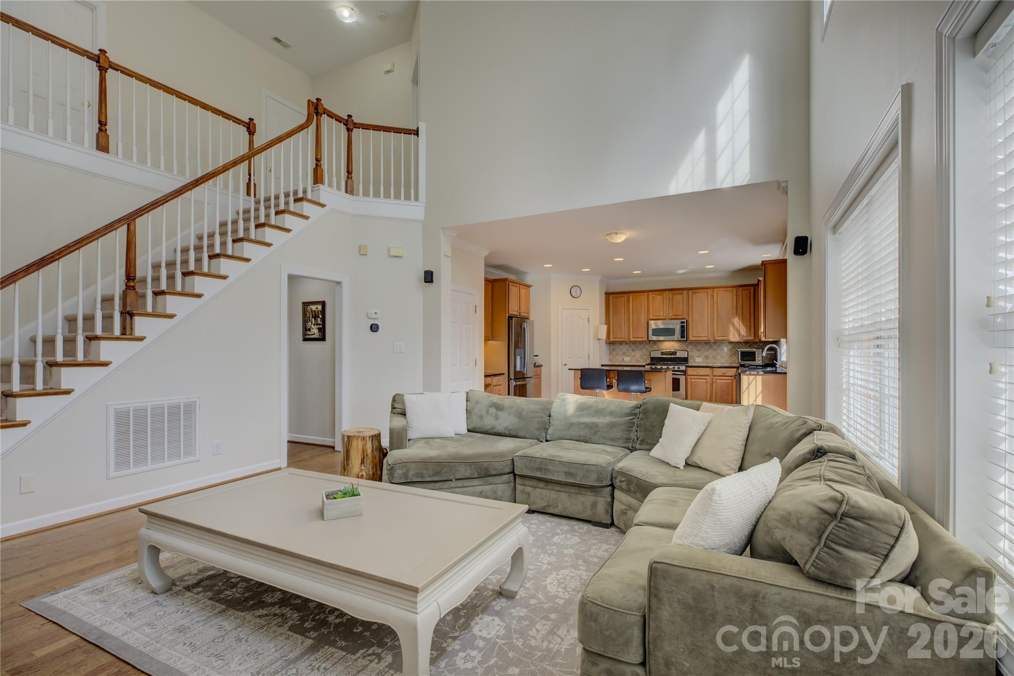 16624 Turtle Point Road Charlotte, NC 28278 - Photo 19 of 46 a living room with furniture and a dining table