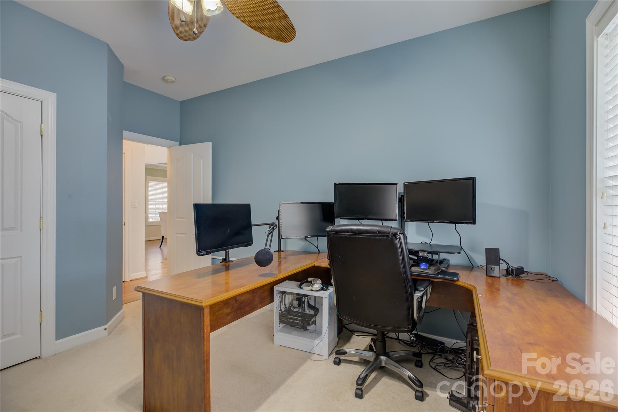 16624 Turtle Point Road Charlotte, NC 28278 - Photo 20 of 46 a view of a workspace with furniture and a window