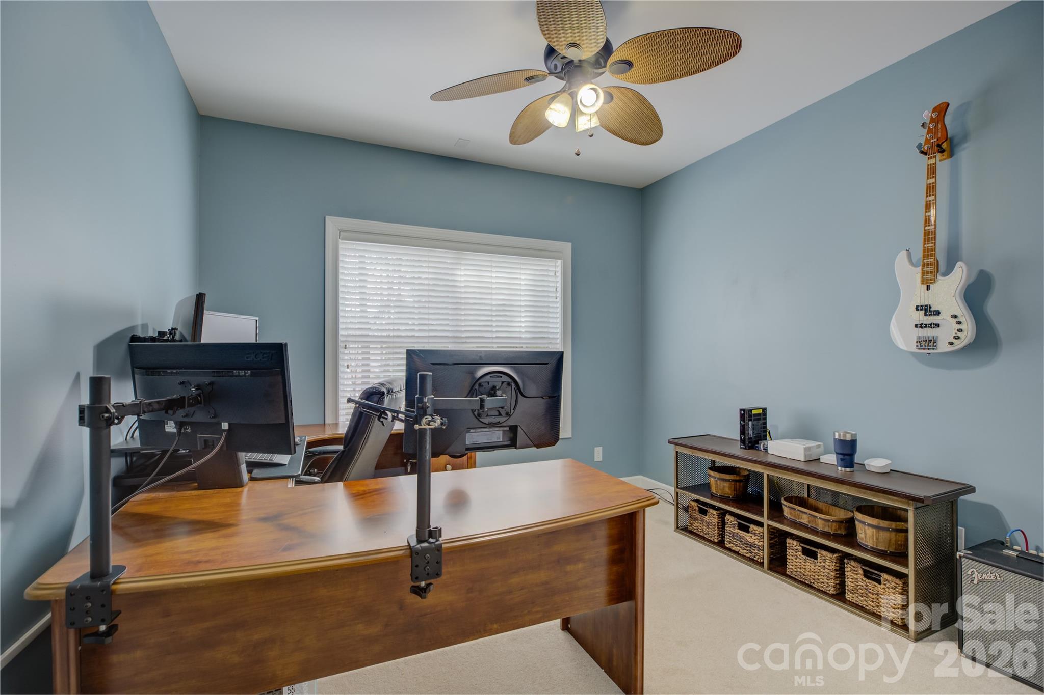 16624 Turtle Point Road Charlotte, NC 28278 - Photo 21 of 46 a room with a chandelier furniture and a flat screen tv
