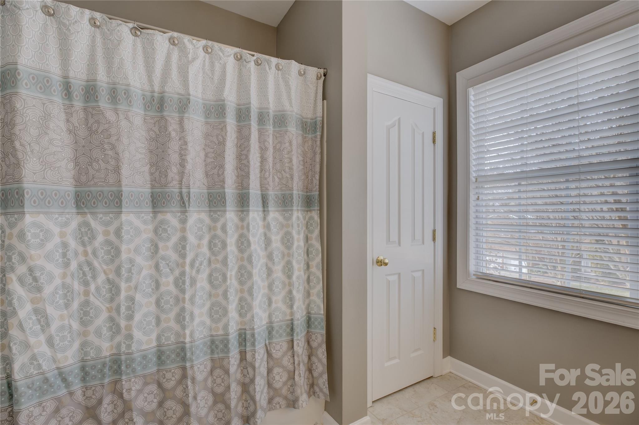 16624 Turtle Point Road Charlotte, NC 28278 - Photo 32 of 46 a view of a bathroom with a window