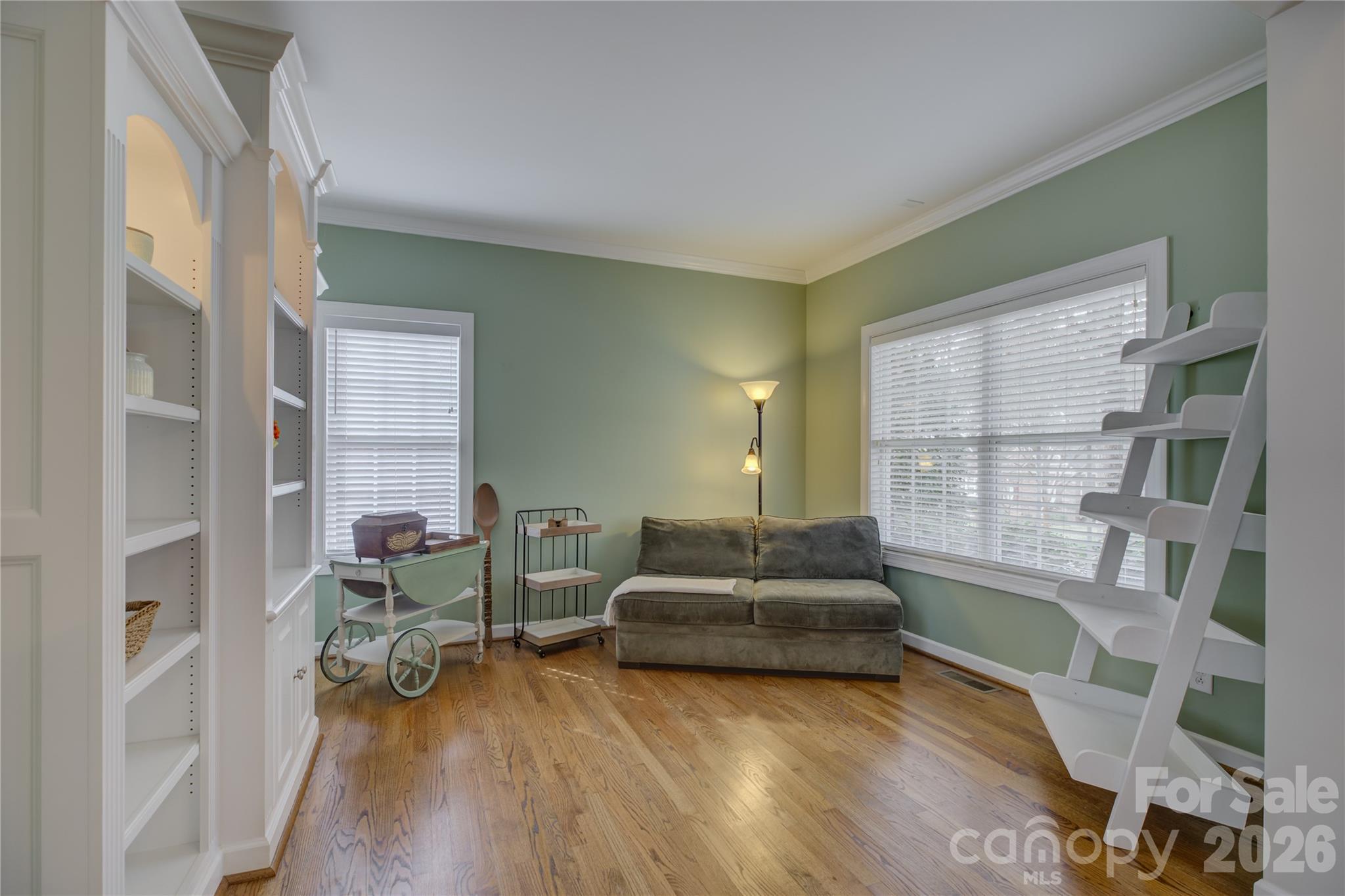 16624 Turtle Point Road Charlotte, NC 28278 - Photo 7 of 46 a living room with furniture and a large window