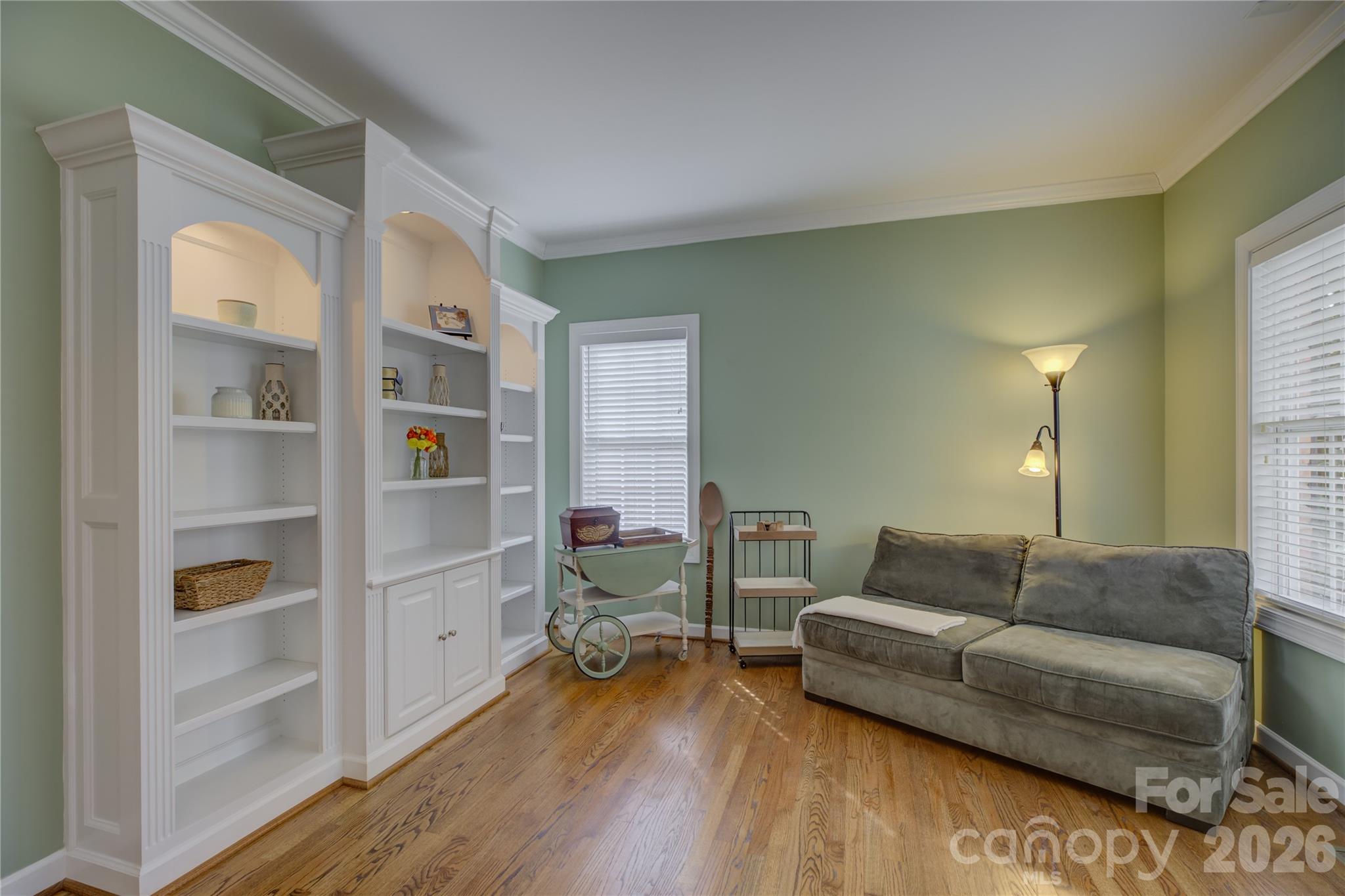 16624 Turtle Point Road Charlotte, NC 28278 - Photo 8 of 46 a living room with furniture and a wooden floor