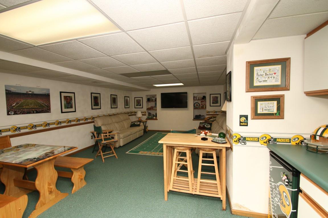 11627 Prestwick Road Belvidere, IL 61008 - Photo 22 of 25 a very nice looking room with many windows