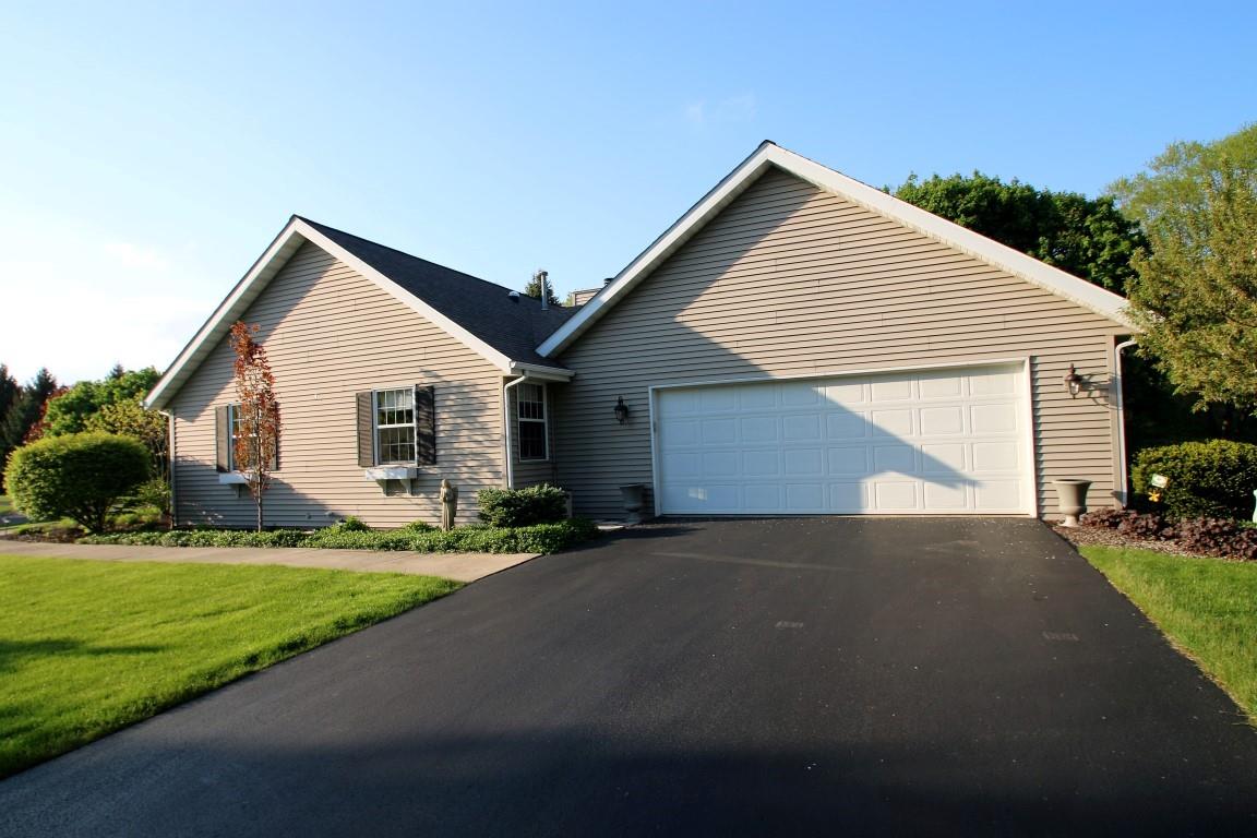 11627 Prestwick Road Belvidere, IL 61008 - Photo 24 of 25 a front view of house with yard and green space