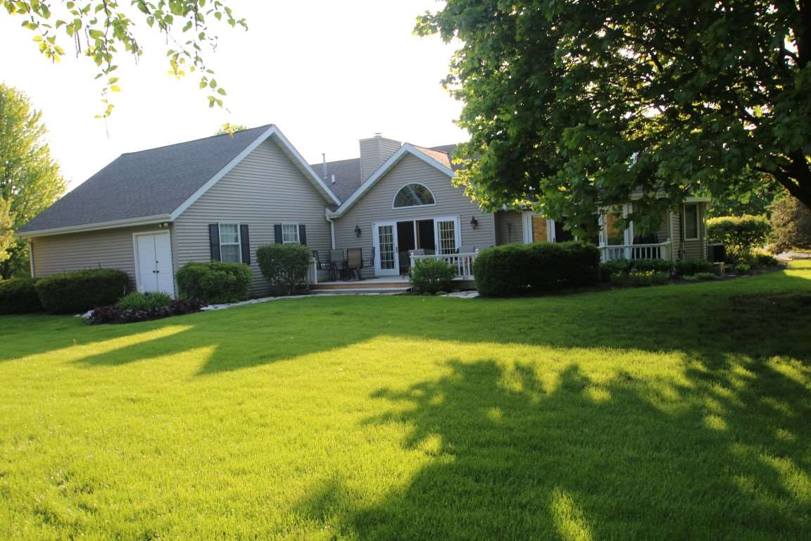 11627 Prestwick Road Belvidere, IL 61008 - Photo 25 of 25 a front view of house with yard and green space