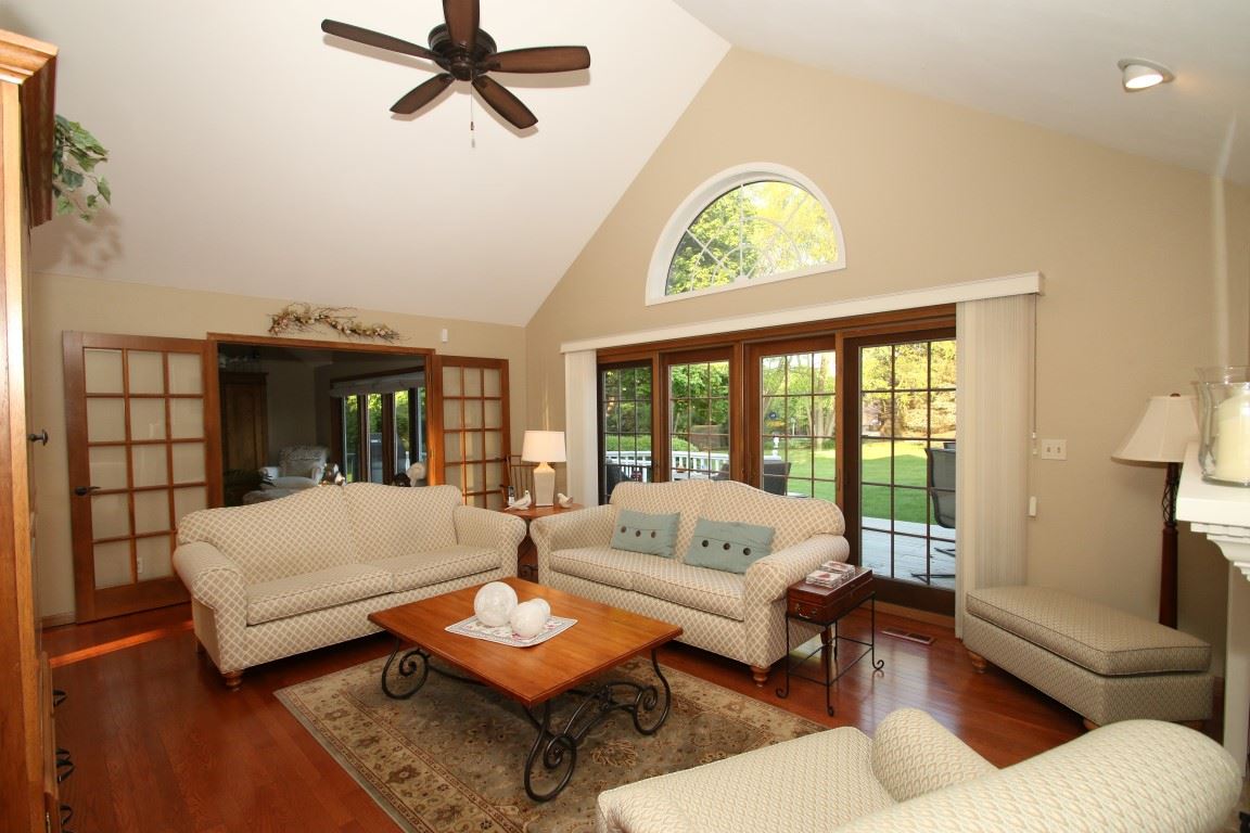 11627 Prestwick Road Belvidere, IL 61008 - Photo 4 of 25 a living room with furniture and a large window