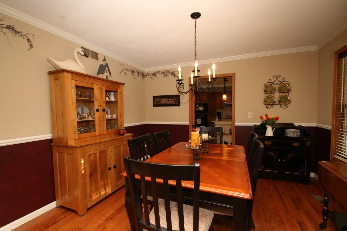 11627 Prestwick Road Belvidere, IL 61008 - Photo 9 of 25 a view of a dining room and a table and chairs