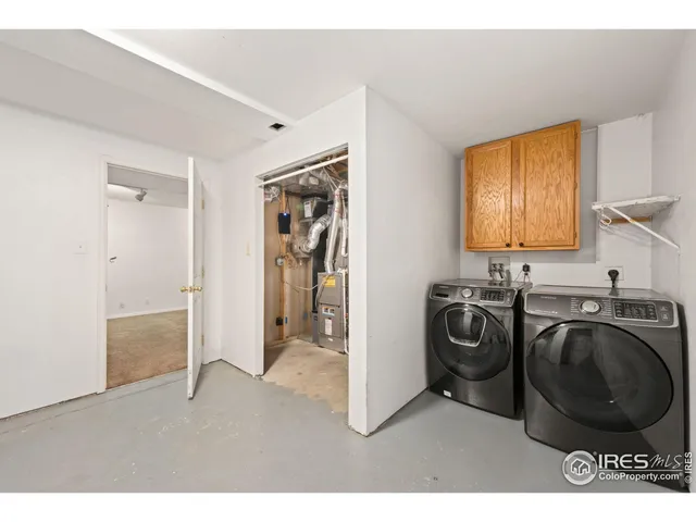 a bathroom with a sink a toilet a mirror and bathtub