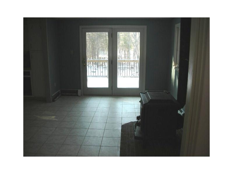 367 Carpenter Road Scituate, RI 02831 - Photo 7 of 15 Dining Room. Open Kit/Din with Wd Stove & Sliders