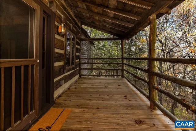 a view of outdoor space with wooden floor