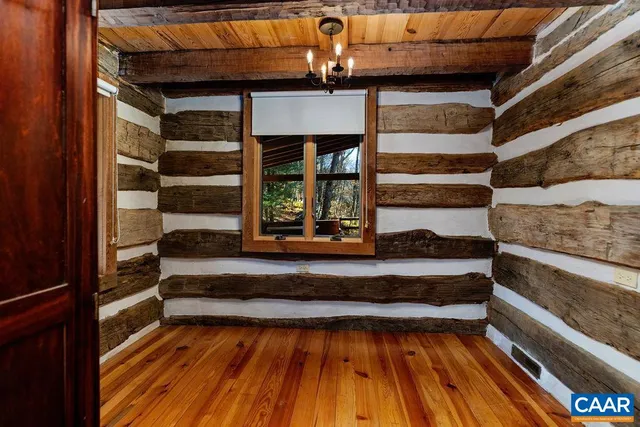 a view of a door and a window