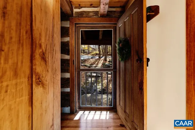 a bathroom with a toilet a sink and a window