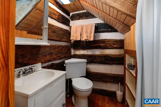 a bed room with a bed and furniture