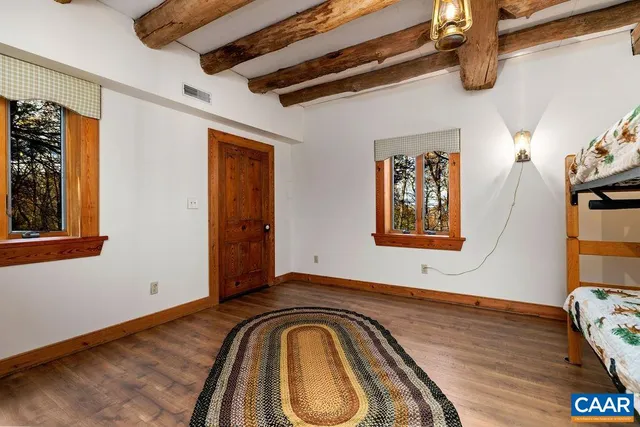 a bathroom with a sink toilet and mirror