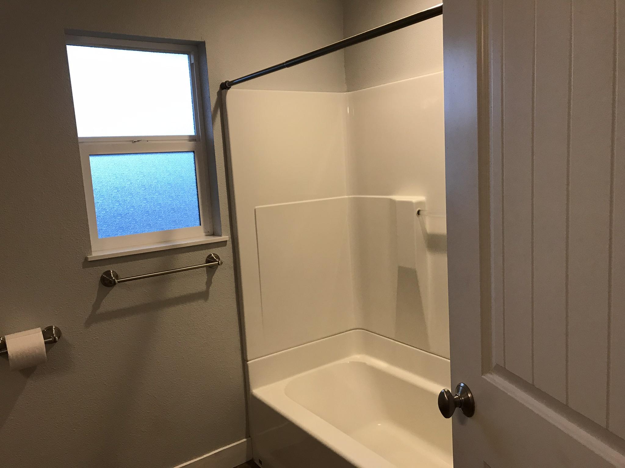 5601 Eastside Road Redding, CA 96001 - Photo 13 of 22 a bathroom with a shower