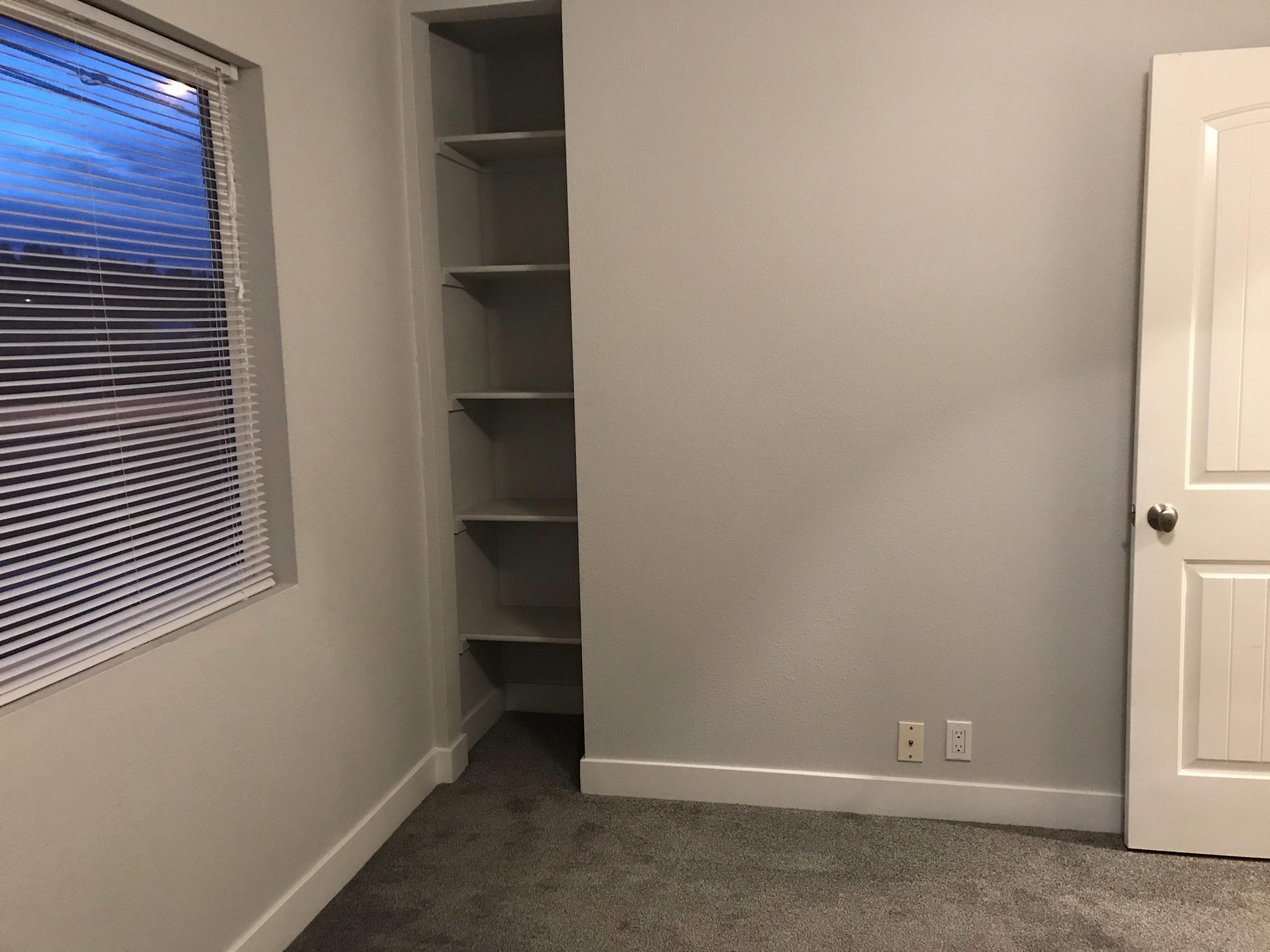 5601 Eastside Road Redding, CA 96001 - Photo 15 of 22 an empty room with shelves