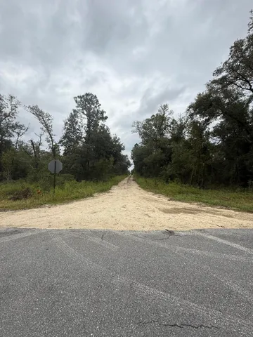 a view of a lake with a big yard