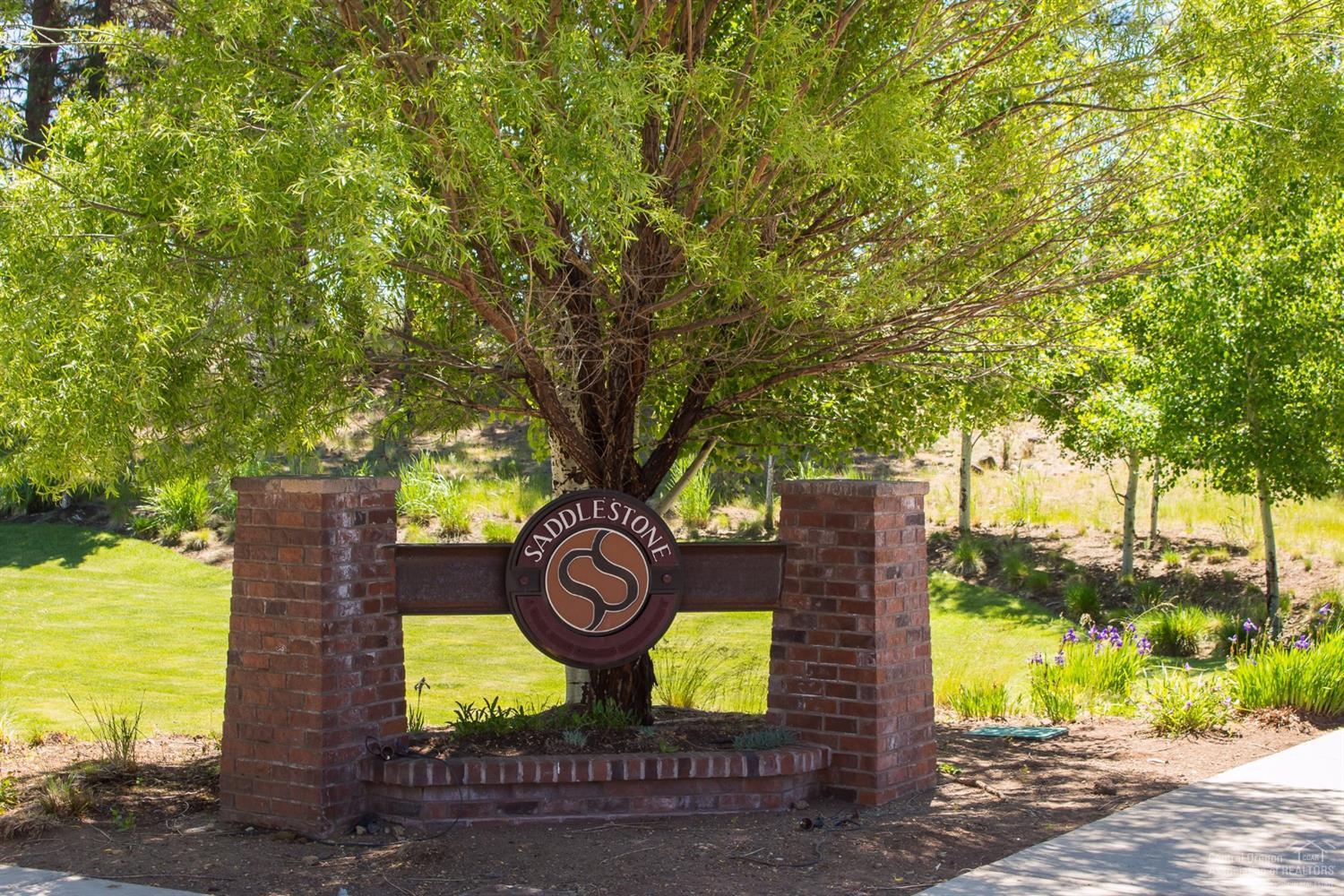 380 North Rope Place Sisters, OR 97759 - Photo 2 of 5 Entrance of Saddle Stone from Cowboy St