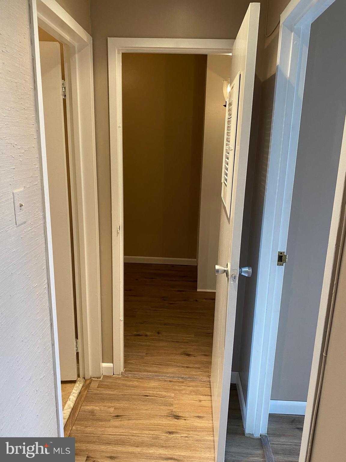 4141 North Henderson Road, Unit 601 Arlington, VA 22203 - Photo 11 of 24 Hallway to Den and Master Bedroom