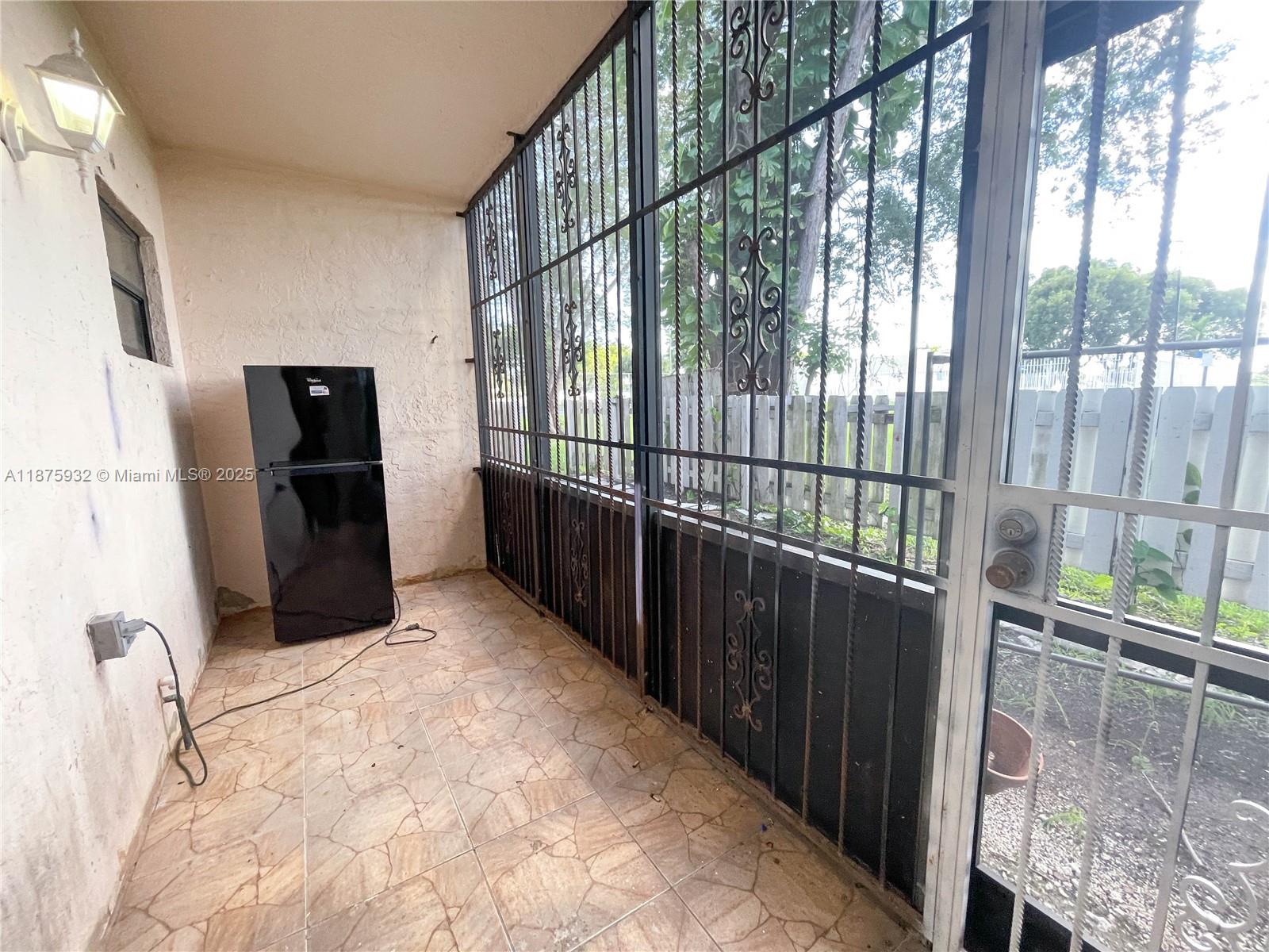 10370 Southwest 220th Street, Unit 129 Miami, FL 33190 - Photo 8 of 8 a view of entryway