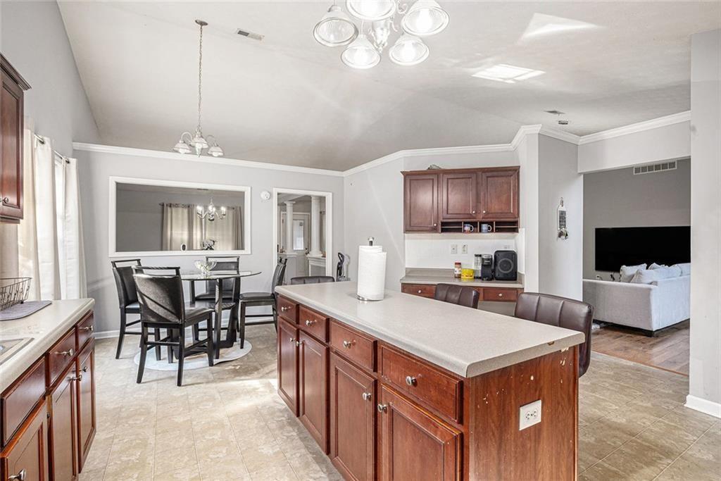 615 Hemlock Court Villa Rica, GA 30180 - Photo 14 of 31 a view of kitchen with sink and living room