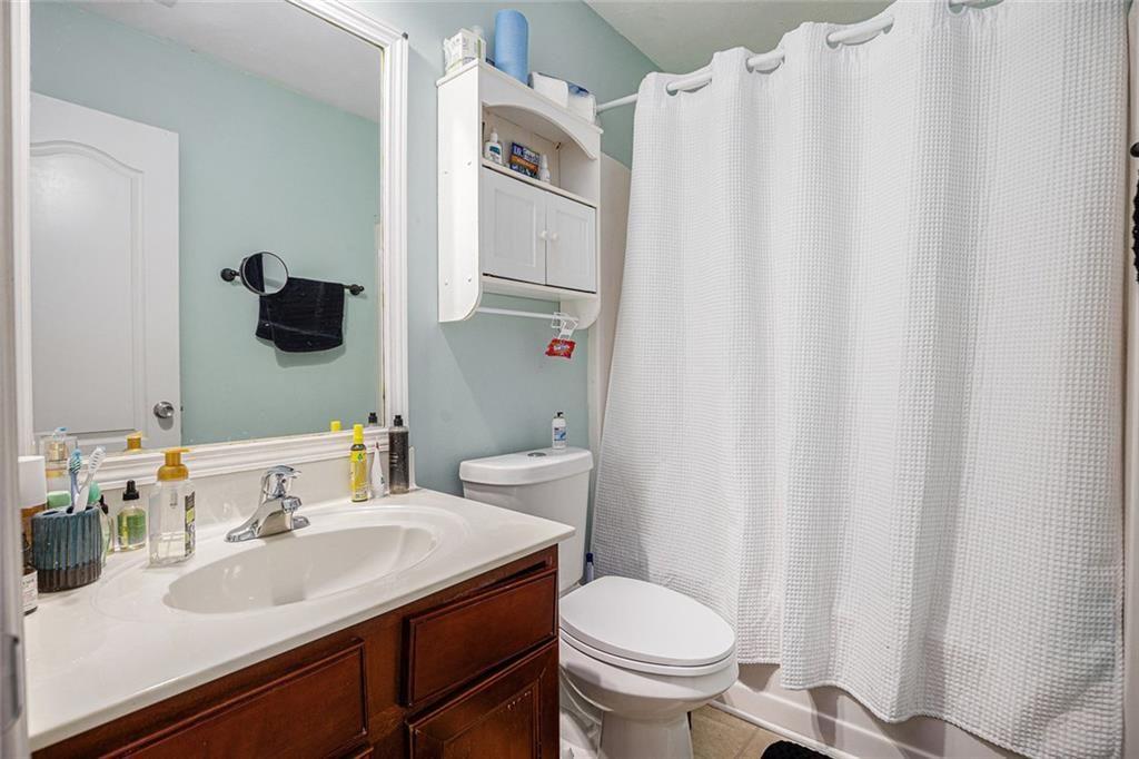 615 Hemlock Court Villa Rica, GA 30180 - Photo 27 of 31 a bathroom with a sink and a toilet