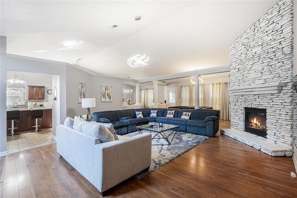 615 Hemlock Court Villa Rica, GA 30180 - Photo 5 of 31 a living room with furniture and a fireplace