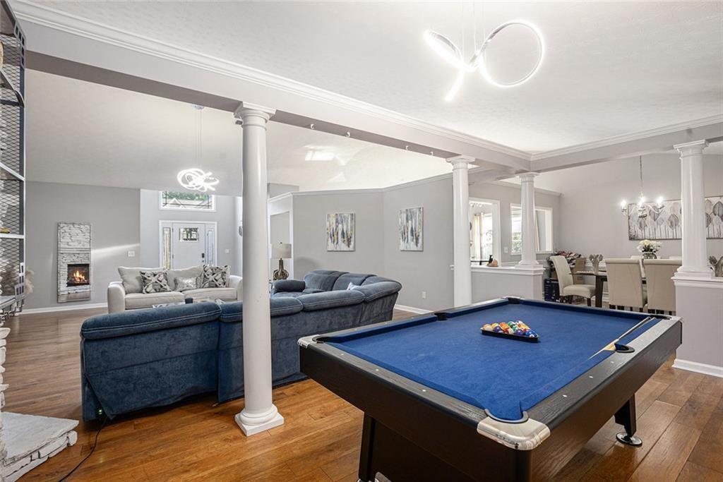 615 Hemlock Court Villa Rica, GA 30180 - Photo 8 of 31 a view of a dining room with furniture and wooden floor