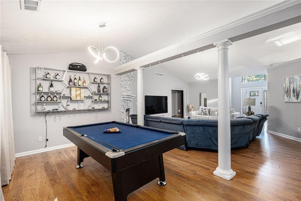 615 Hemlock Court Villa Rica, GA 30180 - Photo 9 of 31 a living room with furniture and wooden floor
