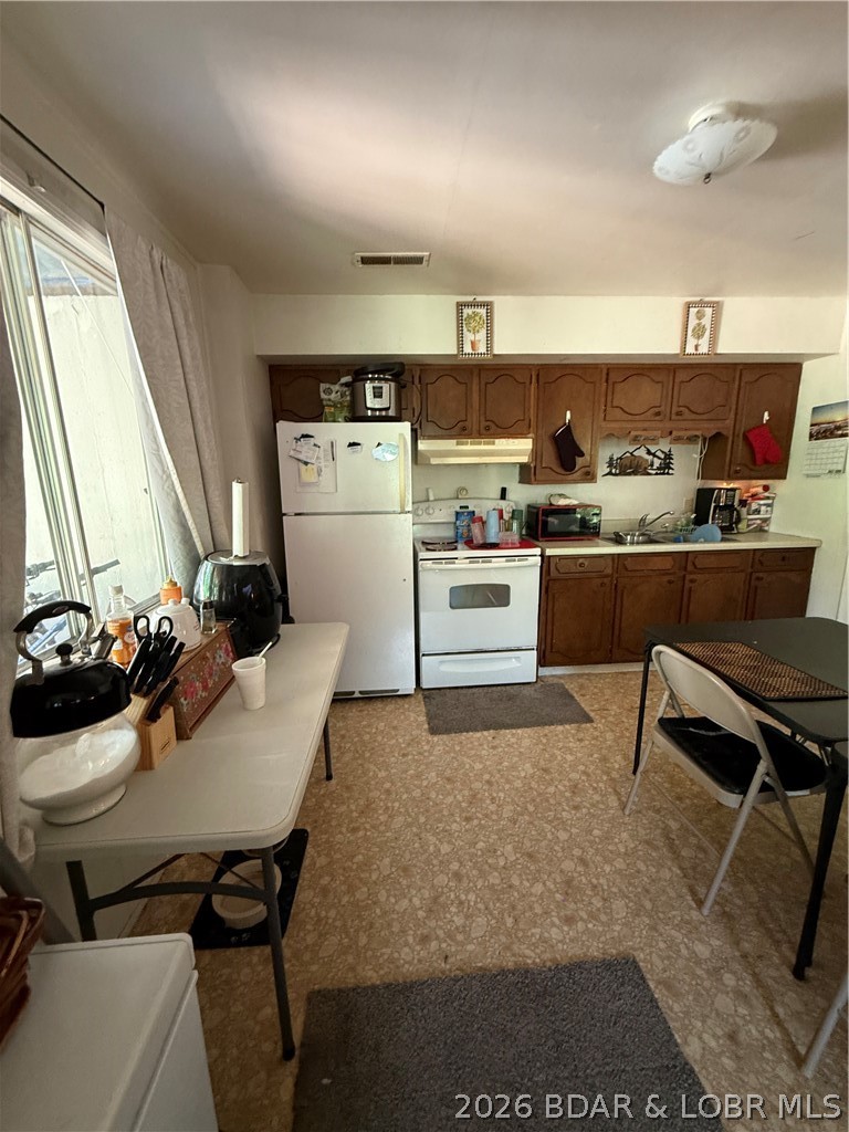 247 Wilmore Road Lake Ozark, MO 65049 - Photo 30 of 42 Lower level kitchen