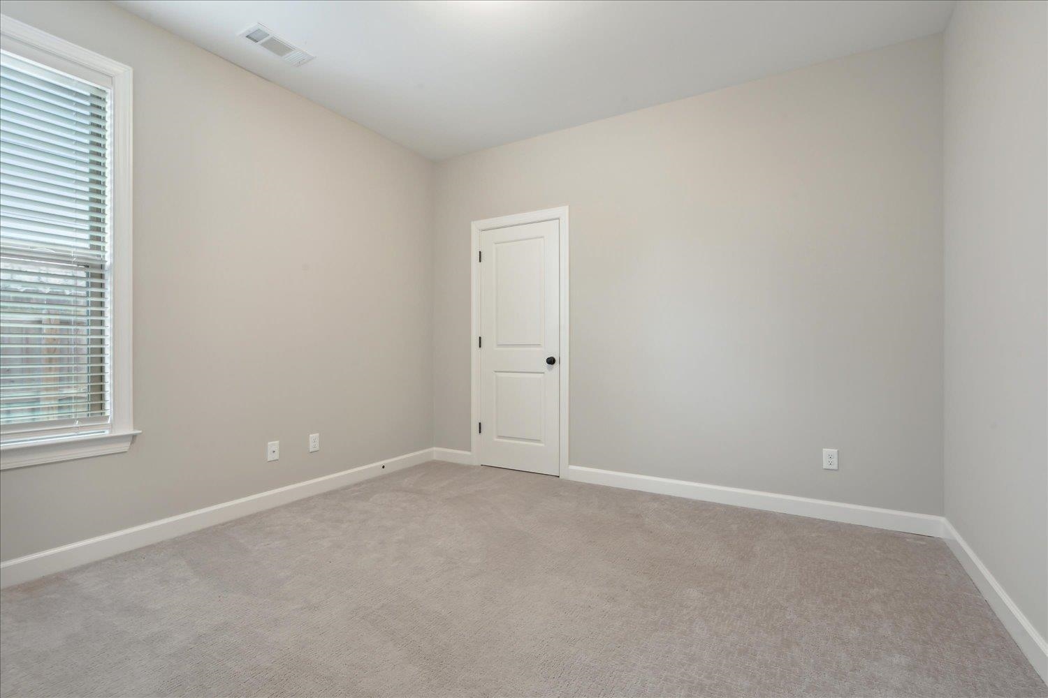 6437 Rutherford Circle Arlington, TN 38002 - Photo 26 of 40 Unfurnished room featuring light carpet