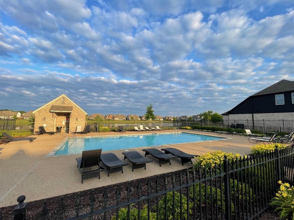 6437 Rutherford Circle Arlington, TN 38002 - Photo 32 of 40 View of swimming pool featuring a patio area