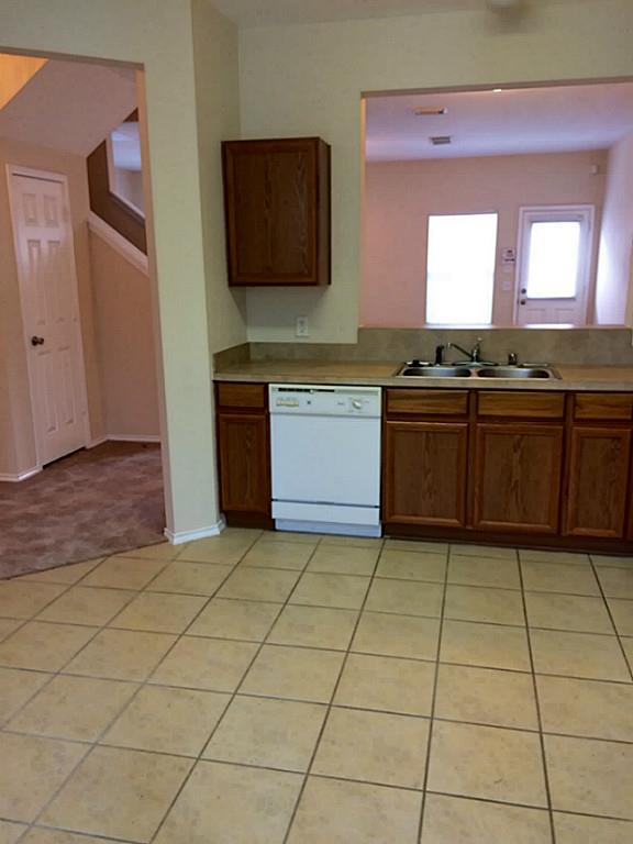 23826 Single Oak Street Spring, TX 77373 - Photo 6 of 28 VIEW FROM BREAKFAST AREA TOWARDS SINK /ENTRY