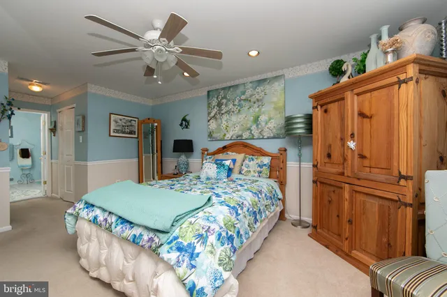 a bathroom with a sink a mirror and a toilet