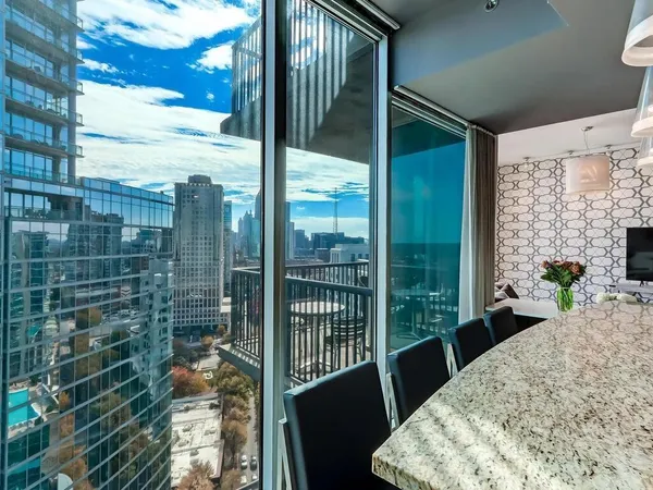 a view of balcony with furniture