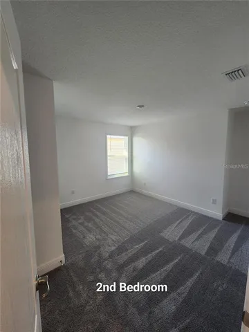 a view of an empty space and window