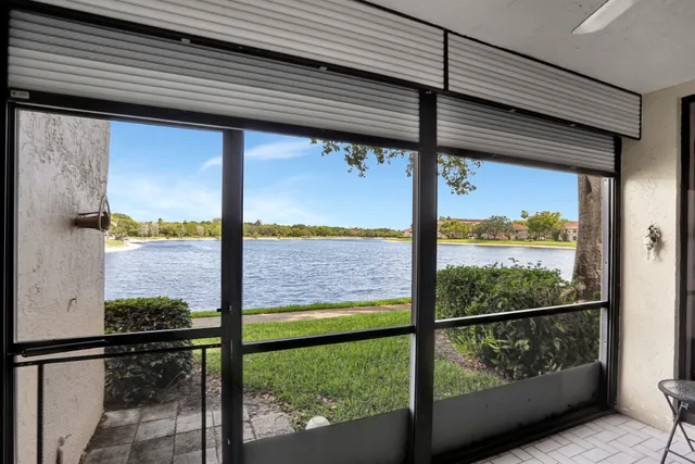 a view of a glass door of the house