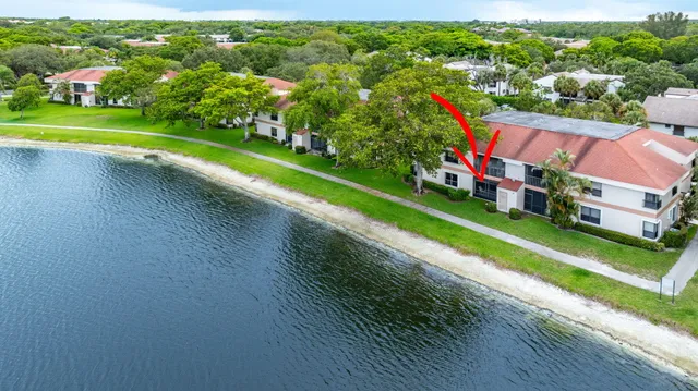 a view of yard with swimming pool and outdoor seating