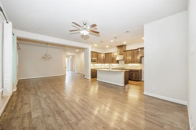 a view of kitchen with wooden floor